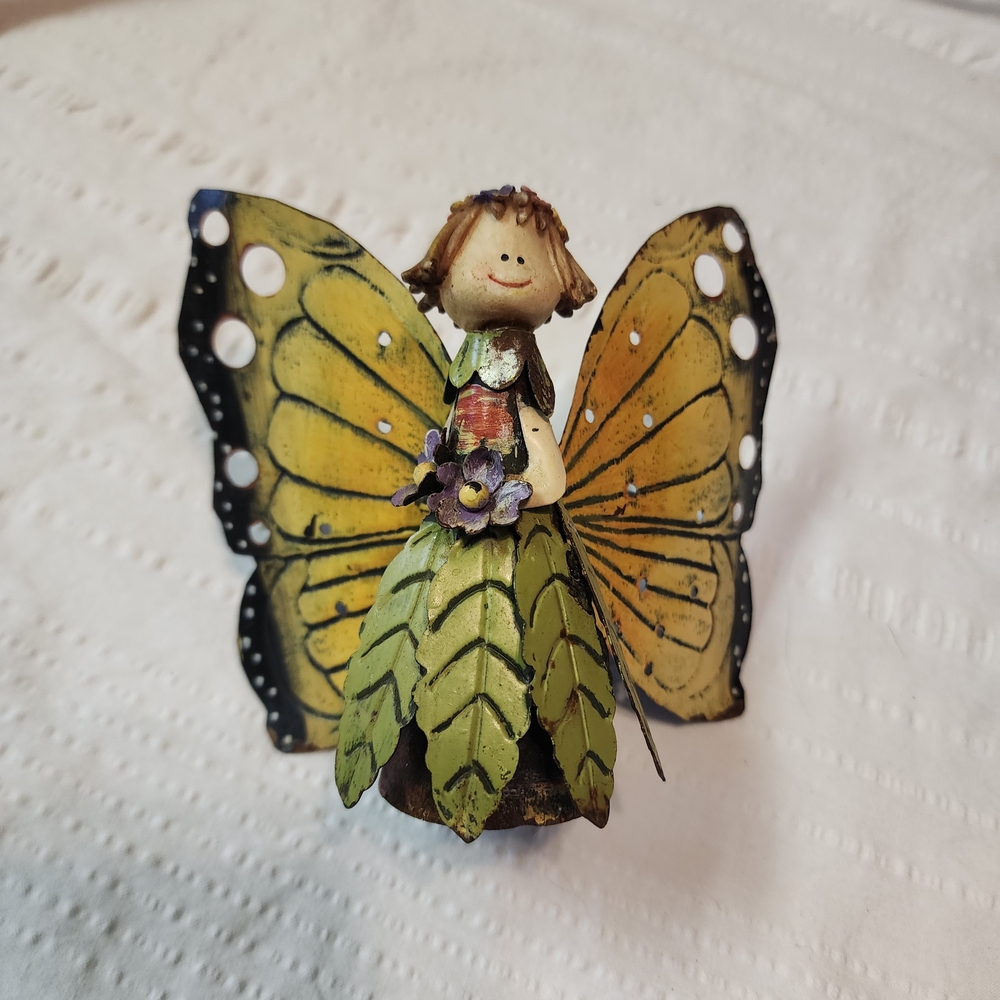 Whimsical Fairy Sculpture with Yellow and Green Accents